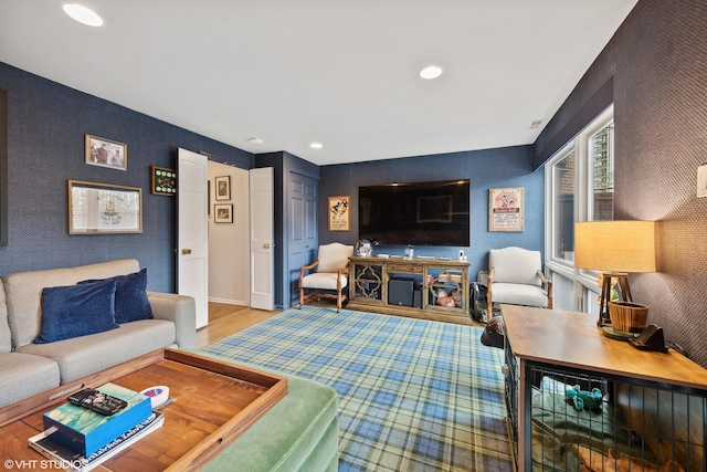 living room featuring recessed lighting and wood finished floors