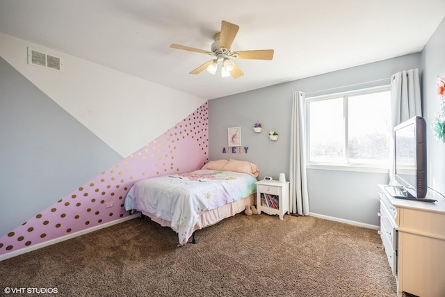 bedroom with visible vents, baseboards, vaulted ceiling, carpet flooring, and a ceiling fan