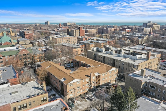 birds eye view of property featuring a city view