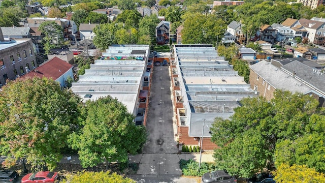 birds eye view of property with a residential view