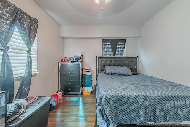 bedroom with wood finished floors