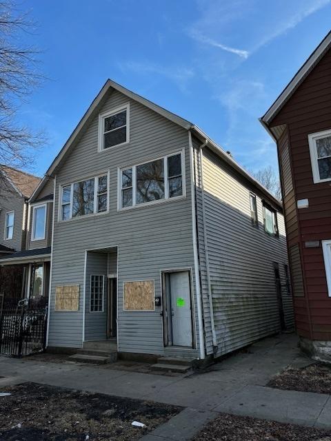 back of property with entry steps