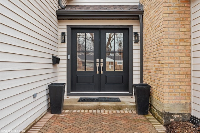 entrance to property featuring french doors