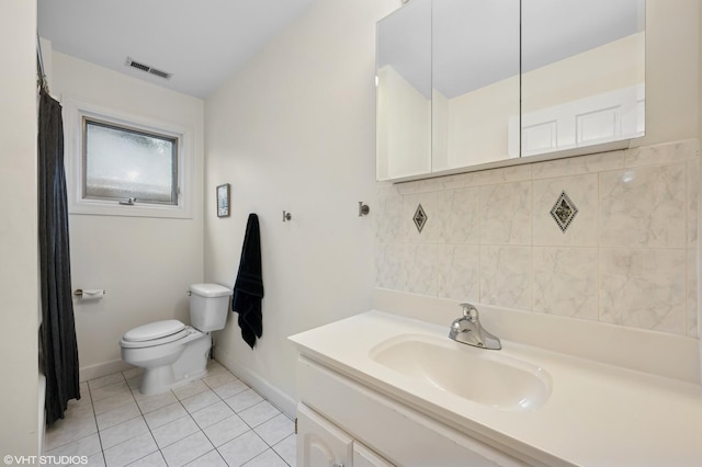 full bath featuring tile patterned floors, visible vents, toilet, baseboards, and vanity