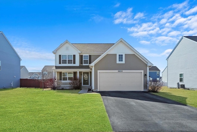 view of front of house with a porch, central air condition unit, driveway, and a front yard