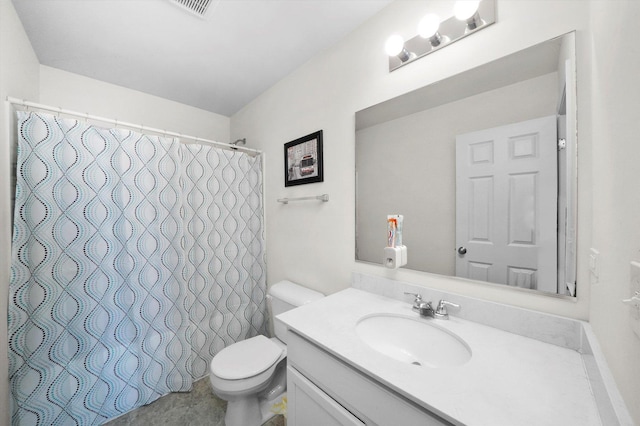 bathroom with vanity, toilet, a shower with curtain, and visible vents