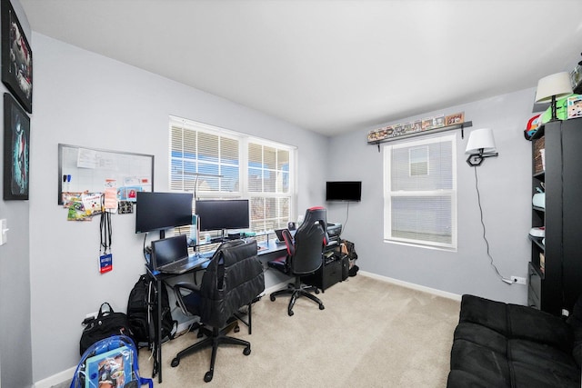 home office featuring baseboards and carpet floors