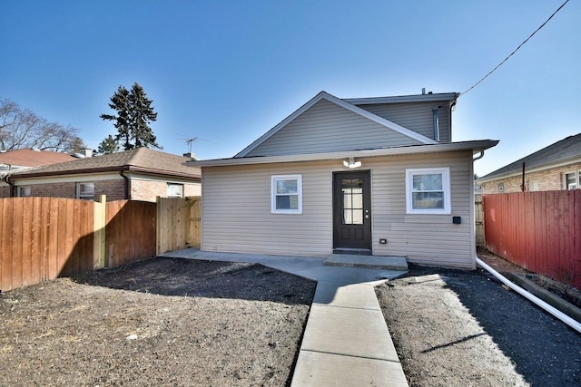 view of front of home with a fenced backyard