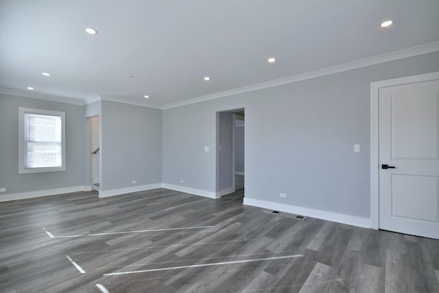 unfurnished room featuring recessed lighting, crown molding, baseboards, and wood finished floors