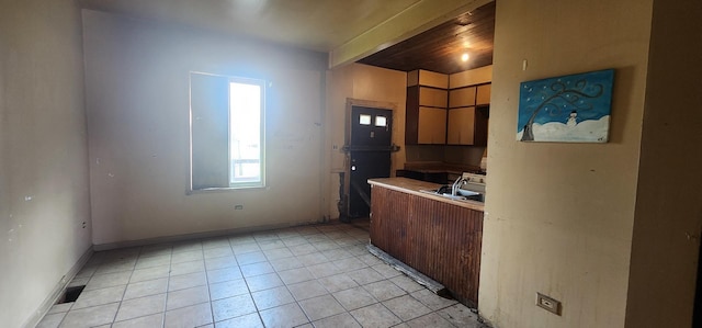 245 153rd Pl, Calumet City, IL 60409 - kitchen featuring baseboards, light countertops, and light tile patterned floors
