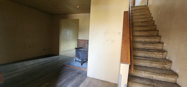 245 153rd Pl, Calumet City, IL 60409 - stairs with a wood stove and wood finished floors