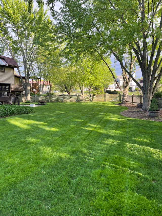 view of yard with fence