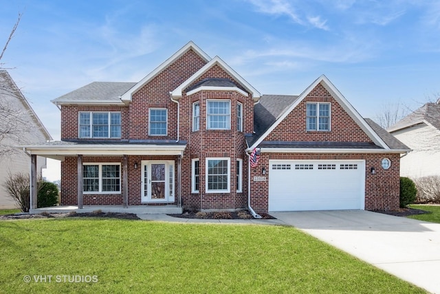 traditional home with a front lawn, brick siding, a porch, and driveway