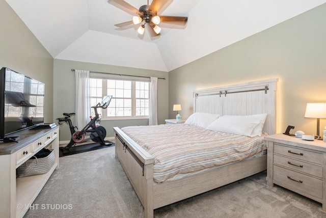 bedroom featuring baseboards, light colored carpet, ceiling fan, and vaulted ceiling