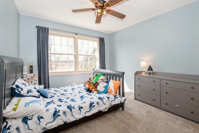 bedroom featuring carpet floors and a ceiling fan