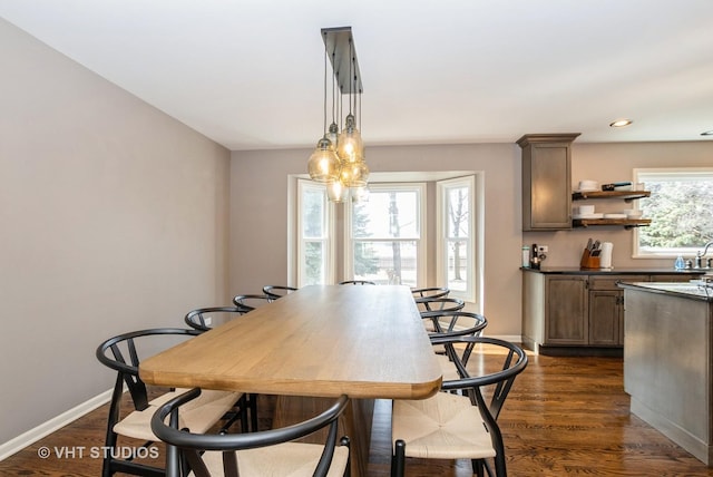 dining room featuring recessed lighting, baseboards, and dark wood-style flooring