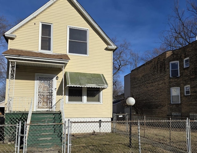 view of front of house featuring a gate and fence private yard