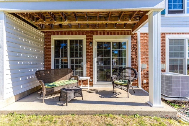 view of patio with central AC unit