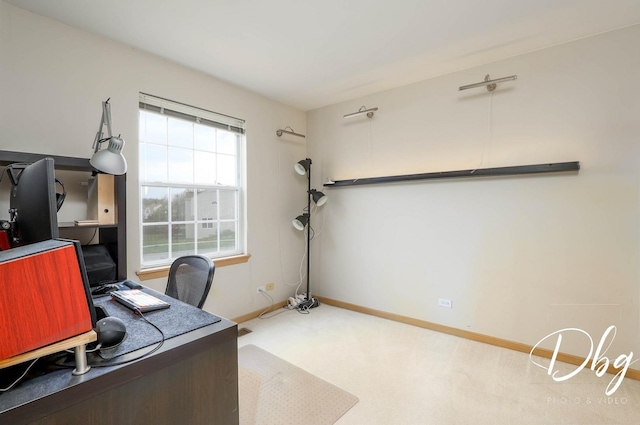 home office featuring carpet floors and baseboards