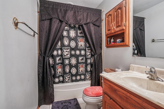 full bathroom with tile patterned floors, toilet, vanity, and shower / tub combo