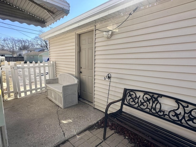 property entrance featuring fence