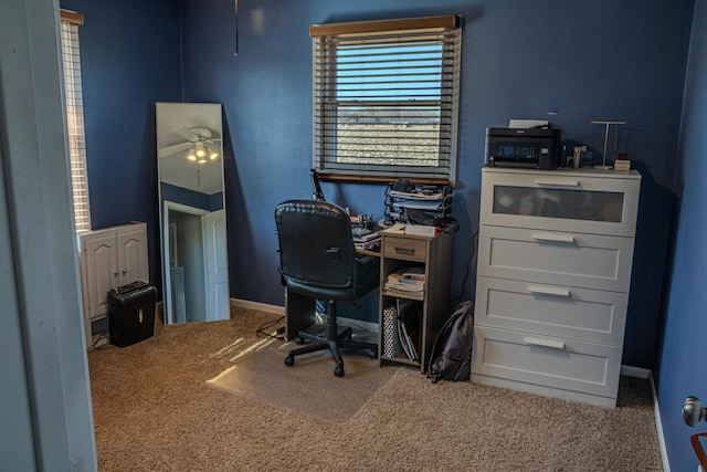 office with baseboards and carpet