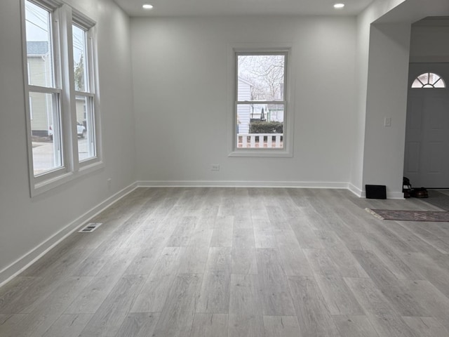 407 Clay St, Ottawa, IL 61350 - unfurnished room with visible vents, recessed lighting, baseboards, and wood finished floors