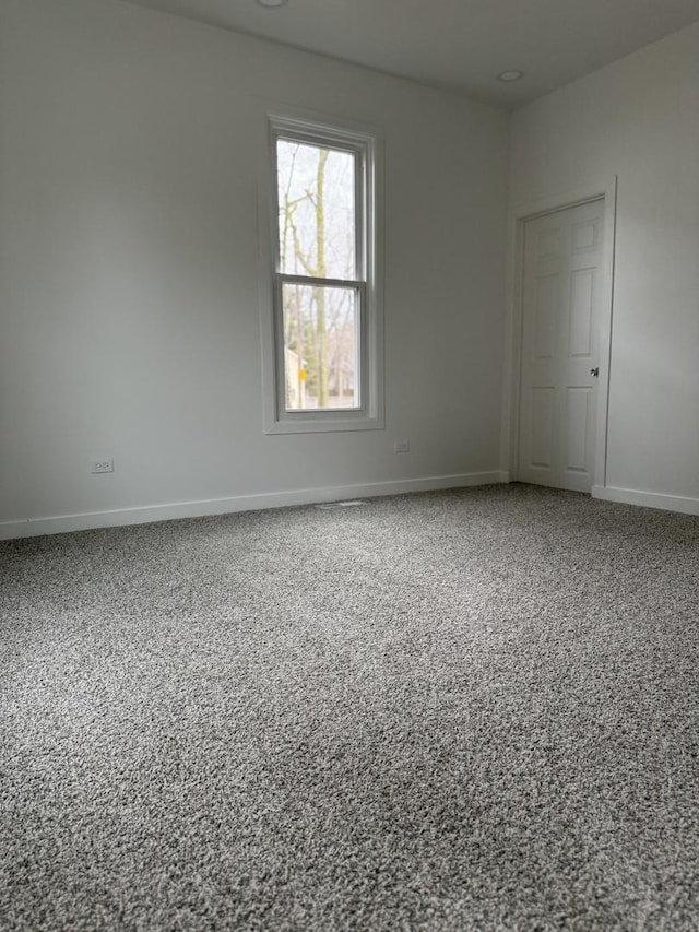 407 Clay St, Ottawa, IL 61350 - spare room featuring baseboards and carpet floors