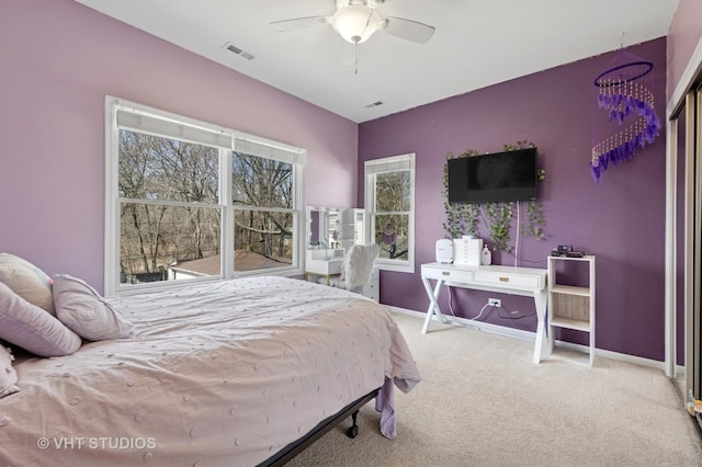 bedroom featuring visible vents, baseboards, and carpet floors