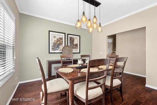 dining room with baseboards, a chandelier, dark wood-style flooring, and crown molding