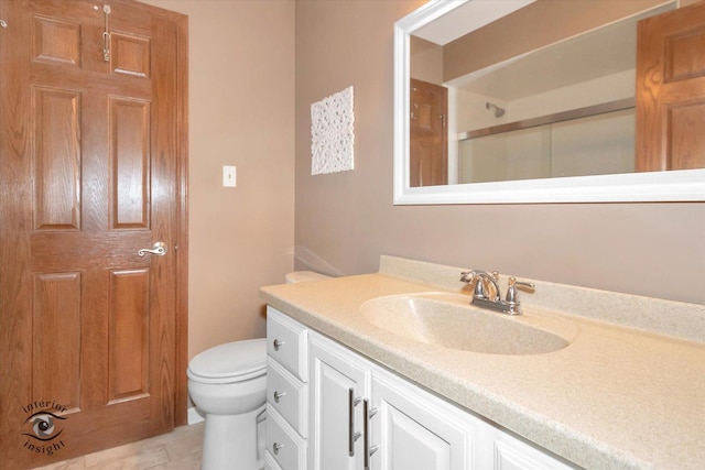 full bath with tile patterned floors, a shower, toilet, and vanity