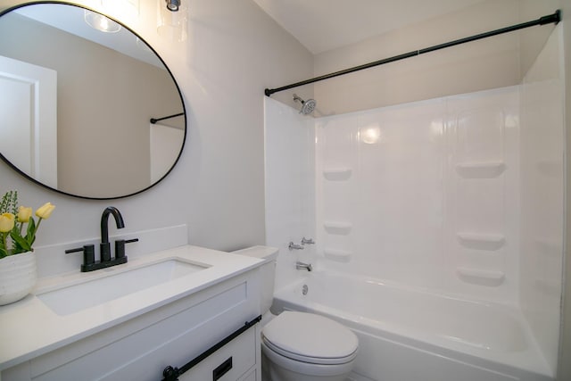 bathroom with vanity, toilet, and shower / bathtub combination