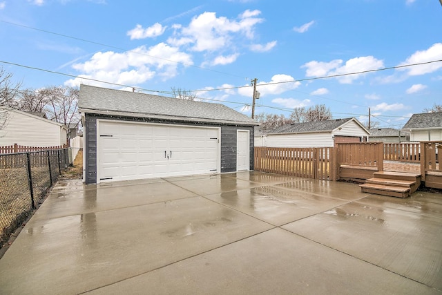 detached garage with fence