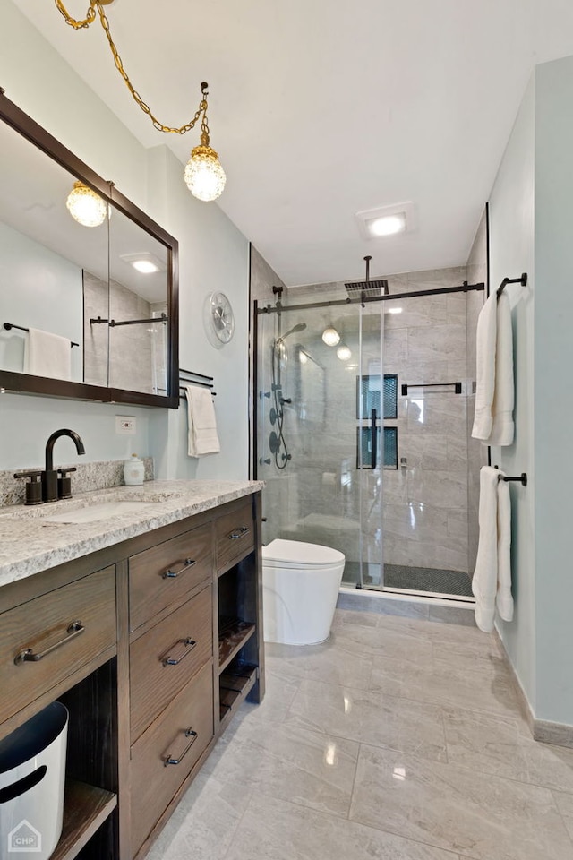 full bath featuring visible vents, toilet, a stall shower, and vanity