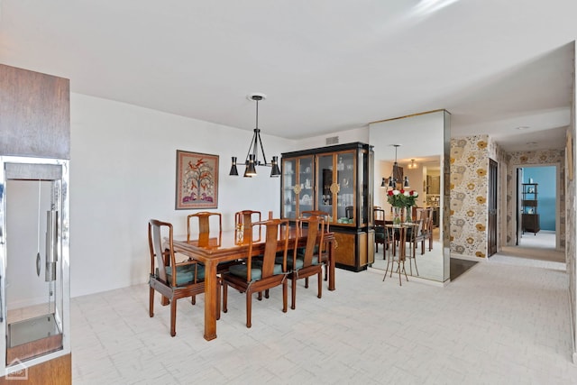 dining space featuring visible vents