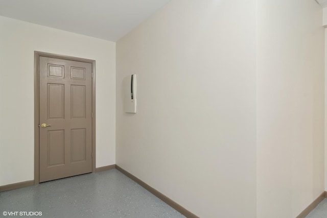 empty room with baseboards