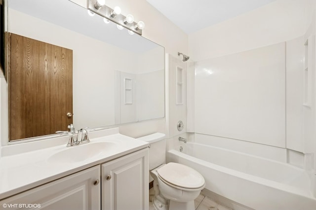 bathroom with toilet, bathtub / shower combination, and vanity