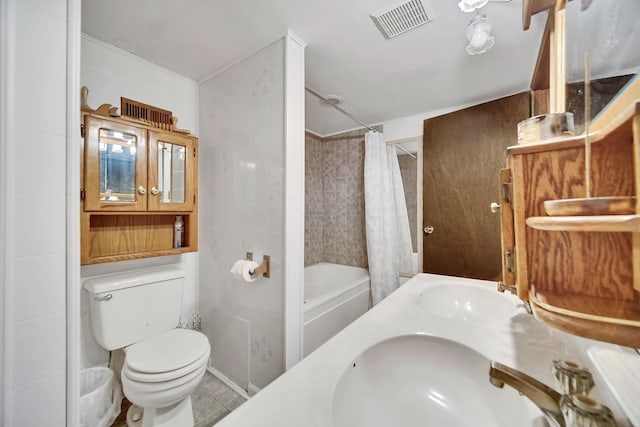 full bathroom featuring toilet, shower / bathtub combination with curtain, visible vents, and a sink