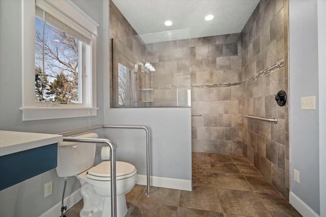 bathroom with recessed lighting, a walk in shower, toilet, and baseboards