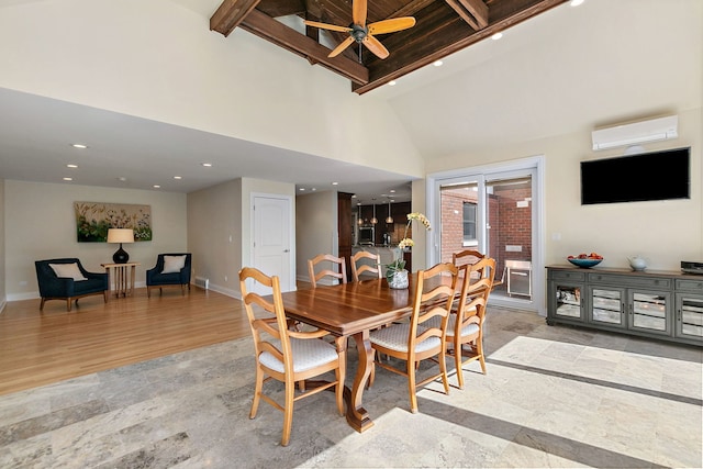 dining room with beamed ceiling, baseboards, a wall unit AC, and a ceiling fan