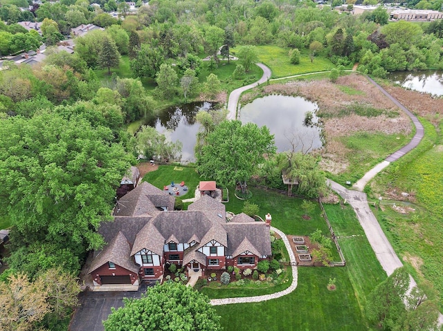 birds eye view of property featuring a water view