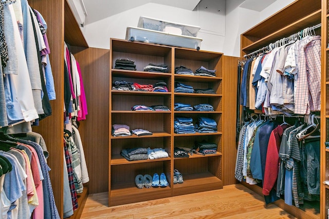 spacious closet with wood finished floors