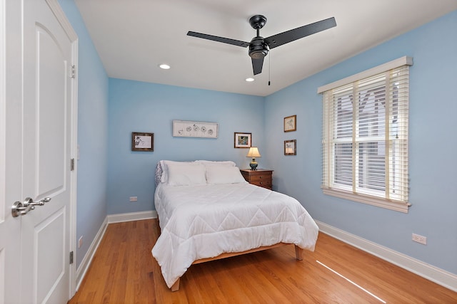 bedroom featuring recessed lighting, ceiling fan, baseboards, and wood finished floors