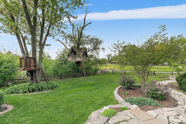 view of yard featuring fence