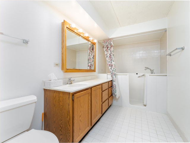 bathroom with tile patterned floors, toilet, a tub, and vanity