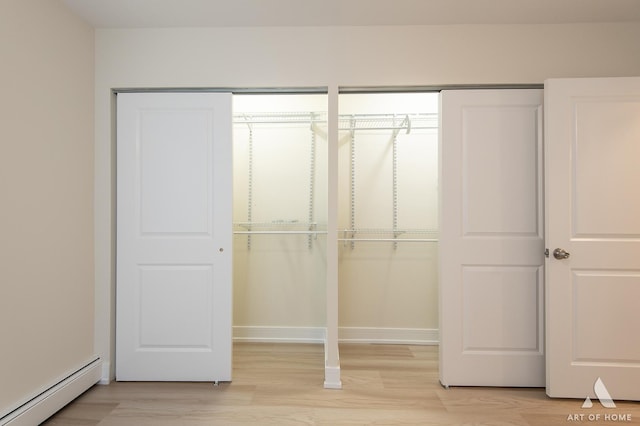 closet with a baseboard radiator