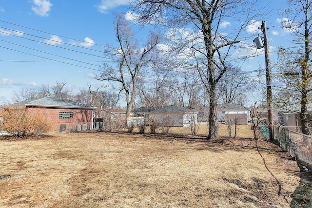 view of yard with fence