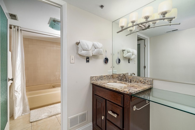 bathroom featuring vanity, tile patterned floors, shower / bath combo with shower curtain, and visible vents