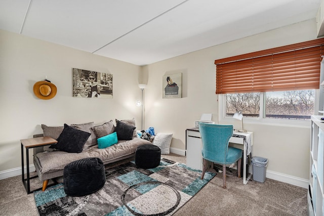 carpeted living room featuring baseboards