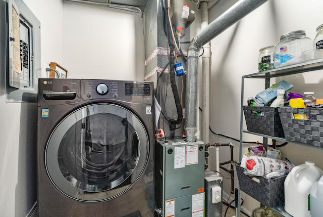 laundry room with washer / dryer and laundry area